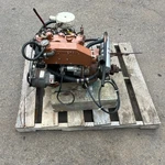 Universal M25, Diesel Engine, 21 Hp, W/ 2:1 Gear Ratio Drop Center Transmission. Fixed Price $3400.00.