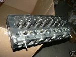 Yanmar 4JH2-DTE Cylinder Head 729574-11700. Fixed Price $2550.00.