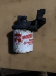 Omc Cobra Fuel Filter With Mounts 912815. Fixed Price $30.00.